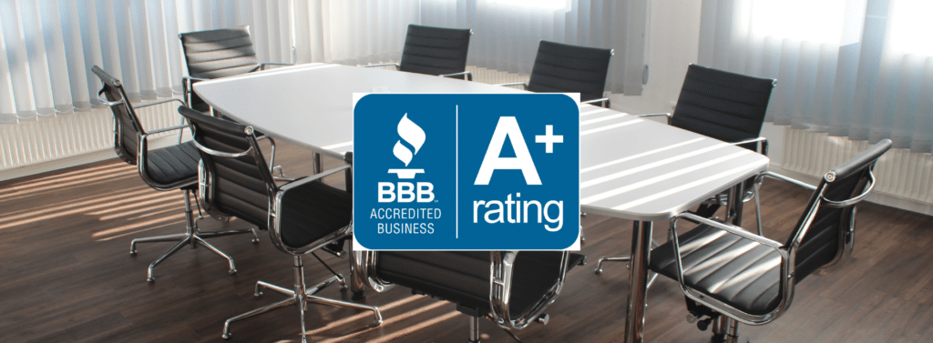 corporate board room scene with BBB A+ Rating Logo front & center
