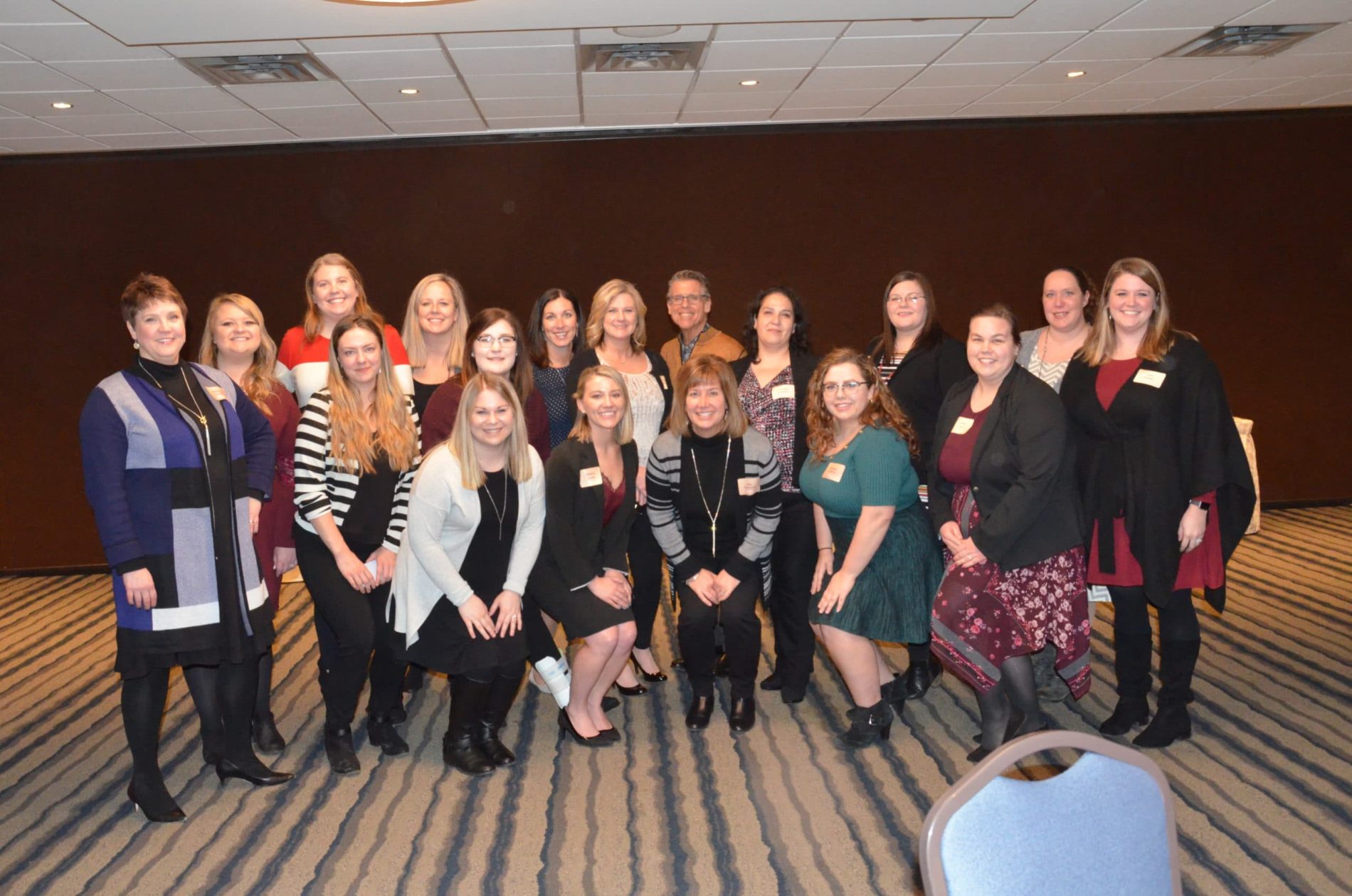 Doherty Employees Posing Together at Winter Party